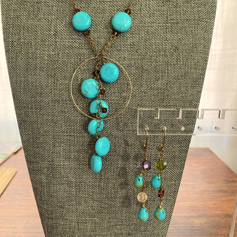 Gorgeous necklace and earring set of dyed howlite and multi colored crystals.